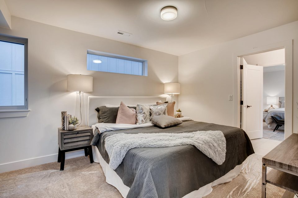 Josephine primary bedroom — spacious layout with large windows