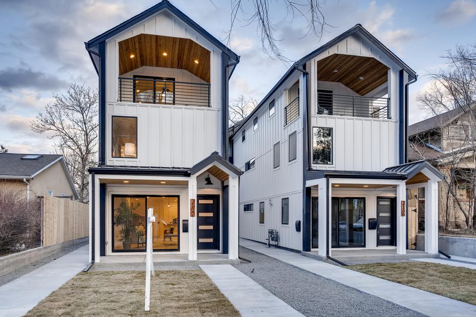 The Josephine — modern duplex built by Renovar Construction at twilight